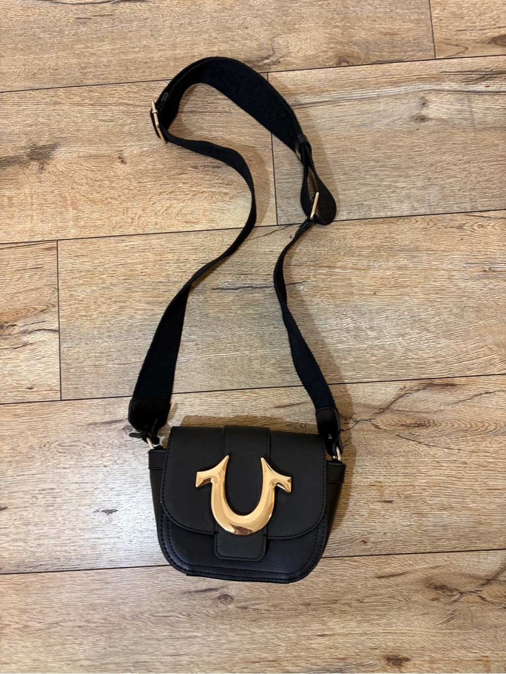 True Religion Black Crossbody Saddle Bag with Gold Horseshoe